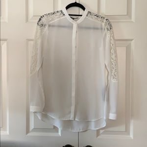 White blouse with lace.